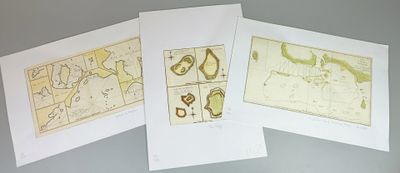 four cards with maps of the world on them on a table