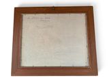 an old wooden frame with a drawing of a man on it