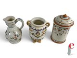 three different types of vases sitting next to each other
