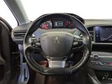 the interior of a car with a steering wheel and dashboard controls