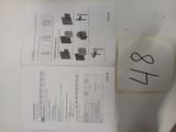 two pages of paper with numbers on them on a table