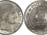 a close up of a coin with a woman ' s face on it