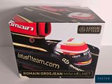 a box with a picture of a racing car inside of it