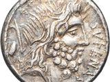 a silver coin with a head of a woman and a crown on it