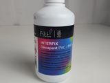 a bottle of interfix paint sitting on top of a white table