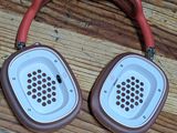a pair of headphones sitting on a wooden floor