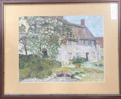 tableau représentant une maison au toit de chaume, dans un cadre