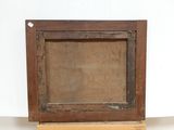 an old wooden picture frame with a wooden stand on a white surface