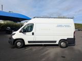 a white van that is parked in a parking lot