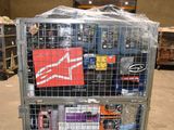 a metal cart with many items in it in a warehouse