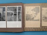 an old book with pictures of people and animals on it