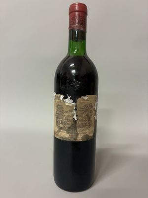 a bottle of wine that is sitting on a table