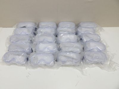 many bags of ice sitting on a table