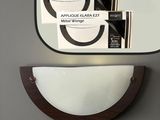 a mirror that has a picture of a cell phone on it