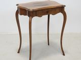 an image of a small wooden table with a drawer underneath it