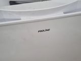 an image of a white refrigerator with the door open