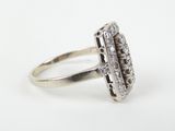 a close up of a diamond ring on a white background