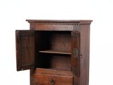 a wooden cabinet with a door open on a white background