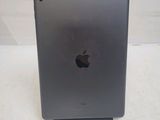 an apple ipad sitting on top of a table with a white background
