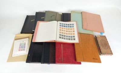 a lot of books and a calculator on the table