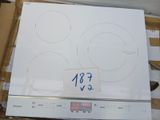 une photo d'une plaque de cuisson sur laquelle est posée une étiquette de prix