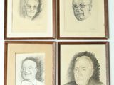four framed portraits of a man, woman, and child in a wood frame