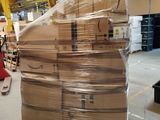 a large stack of boxes sitting on a pallet in a warehouse
