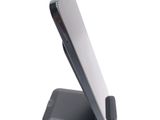 a cell phone that is sitting on top of a stand