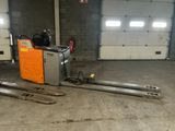 a picture of a forklift in a warehouse