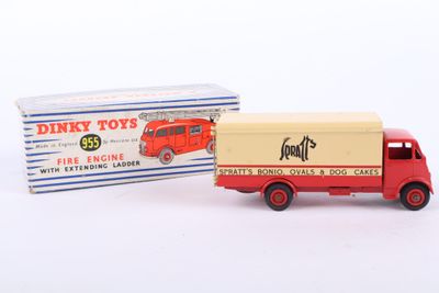 a small toy truck with a box on the back of it
