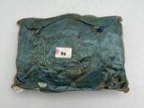 a piece of cloth with writing on it on a table