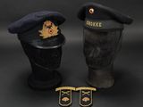two hats and a pair of shoes are sitting on a table