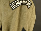 a close up of a military uniform with a patch on the chest