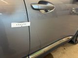 a sticker on the side of a car door