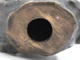 a close up of a piece of wood with a hole in it