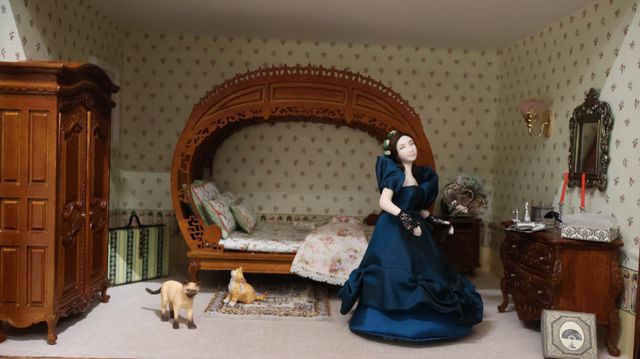 Diorama. Composition miniature, dans une vitrine en bois, vitre e...