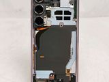 a close up of a cell phone with a broken battery