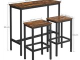 the dimensions of the table and stools are shown