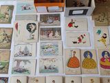 a lot of cards that are on the table