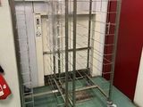 a metal rack that has a bunch of items on it