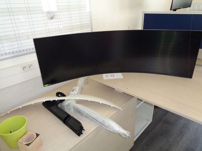 an image of a desk with two monitors on it