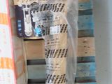 a wooden pallet that has a bunch of items on it