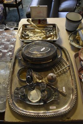 a tray of silverware on a table with a tray of silverware on it
