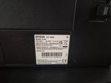 a close up of the back of a printer with a label on it