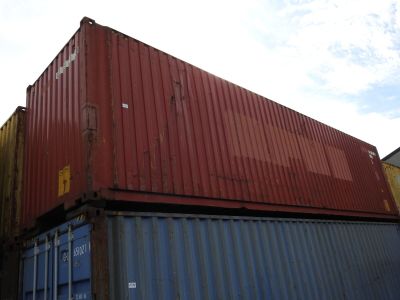 a red container sitting on top of a blue container