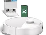 an image of a robotic vacuum cleaner with a phone on top of it