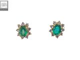 an image of a pair of emerald and diamond earrings