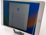 an image of a tablet computer sitting on top of a white table