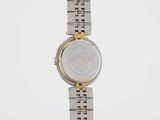 an image of a woman ' s wrist watch on a white background