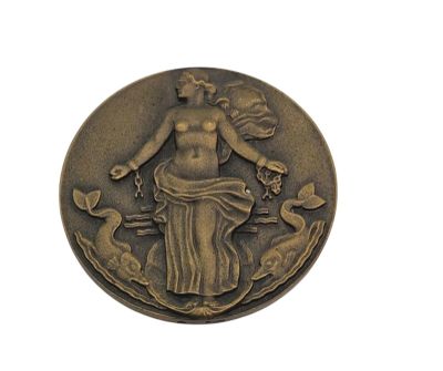 an image of a bronze coin with a woman on it